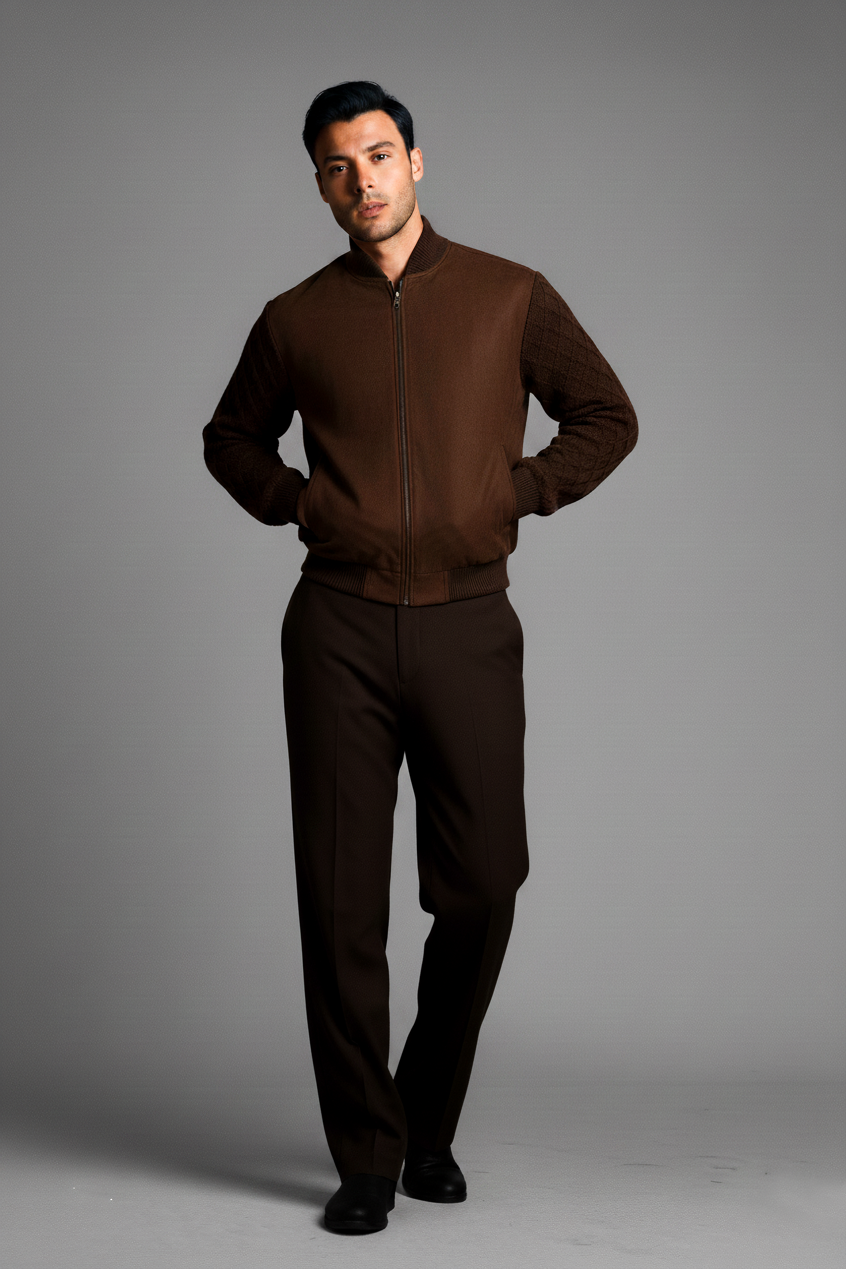 Suede sweater with knitted sleeves