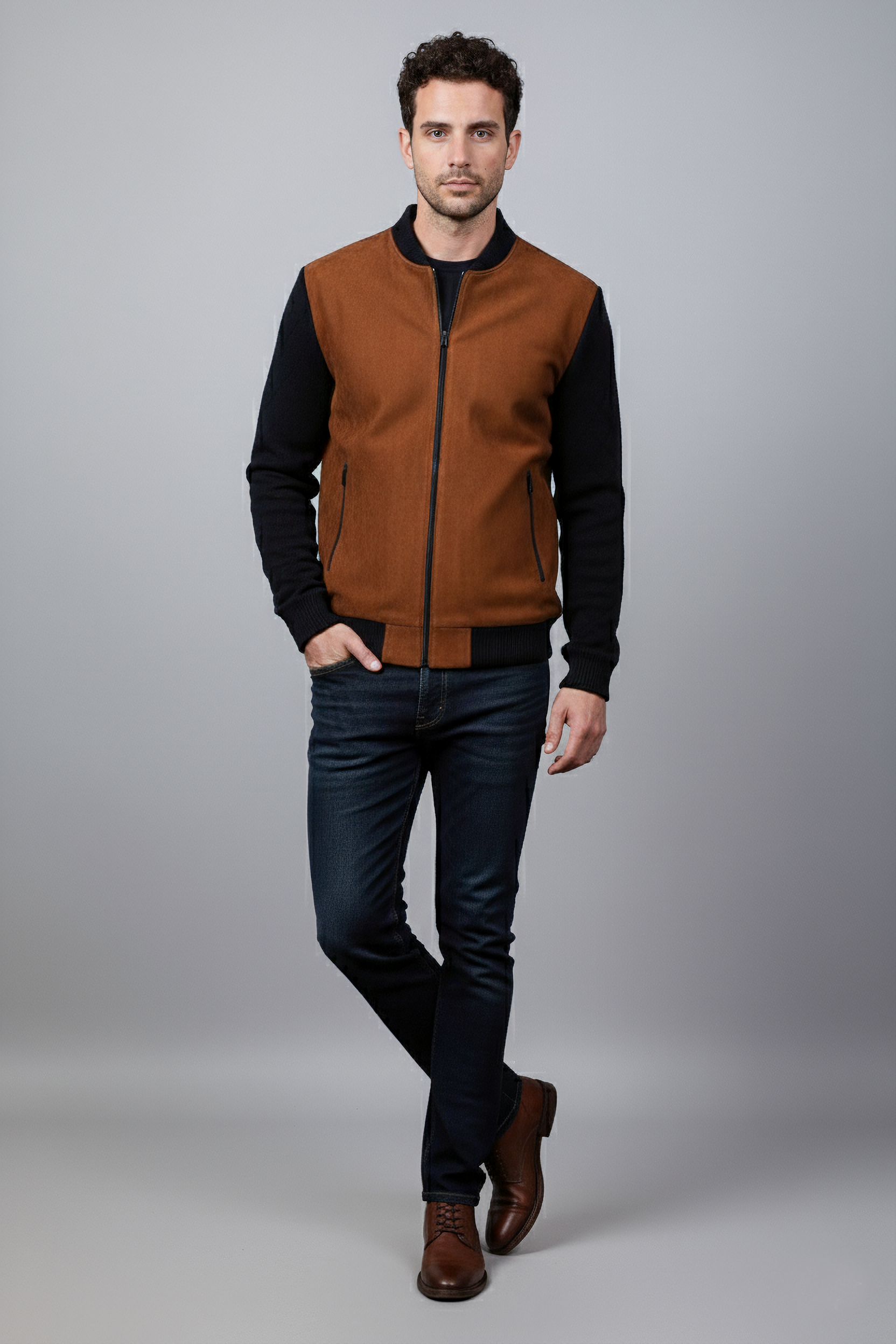 Suede sweater with knitted sleeves